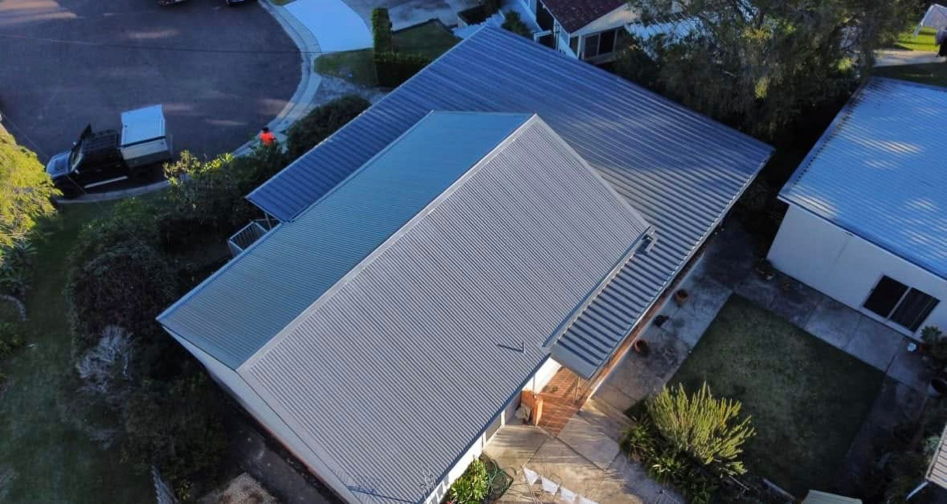Aerial View of a House With a Gray Corrugated Metal Roof — Your Craftsmen in Cessnock, NSW