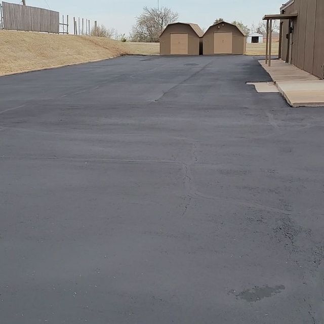 A Concrete Area with Buildings — Midwest City, OK — MPSC