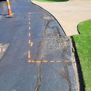 A Road with a Puddle on the Side — Midwest City, OK — MPSC