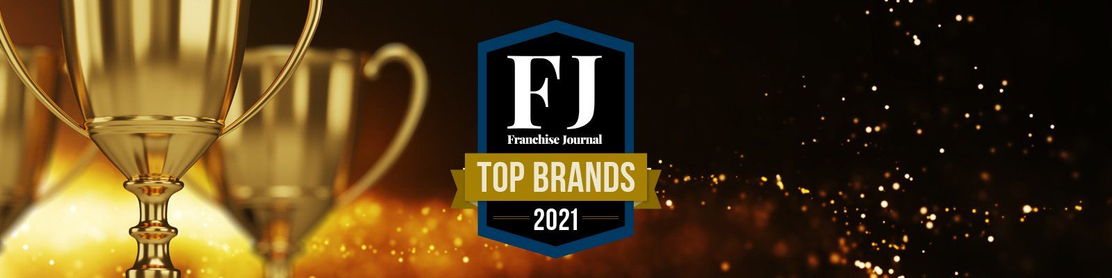 A picture of a trophy with the words `` top brands 2021 '' on it.