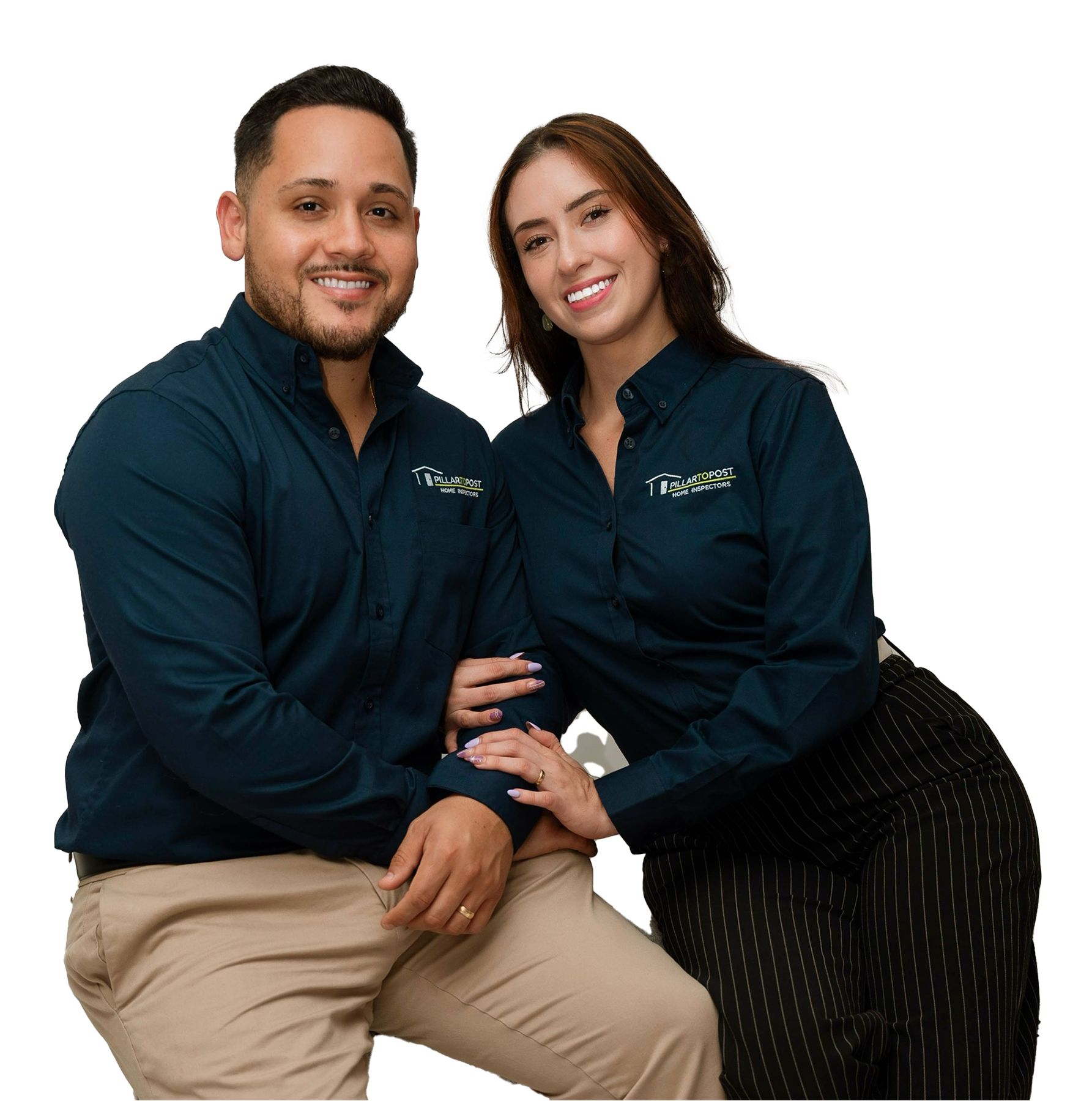 A man and a woman are standing on the porch of a house.