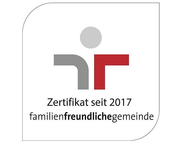 Logo with gray and red emblem, text "Zertifikat seit 2017 familienfreundlichegemeinde"