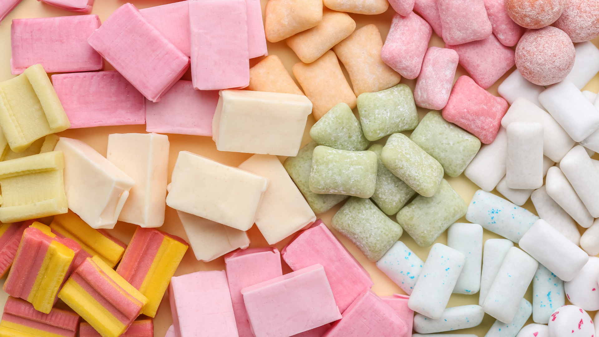 There are many different types of chewing gum on the table.