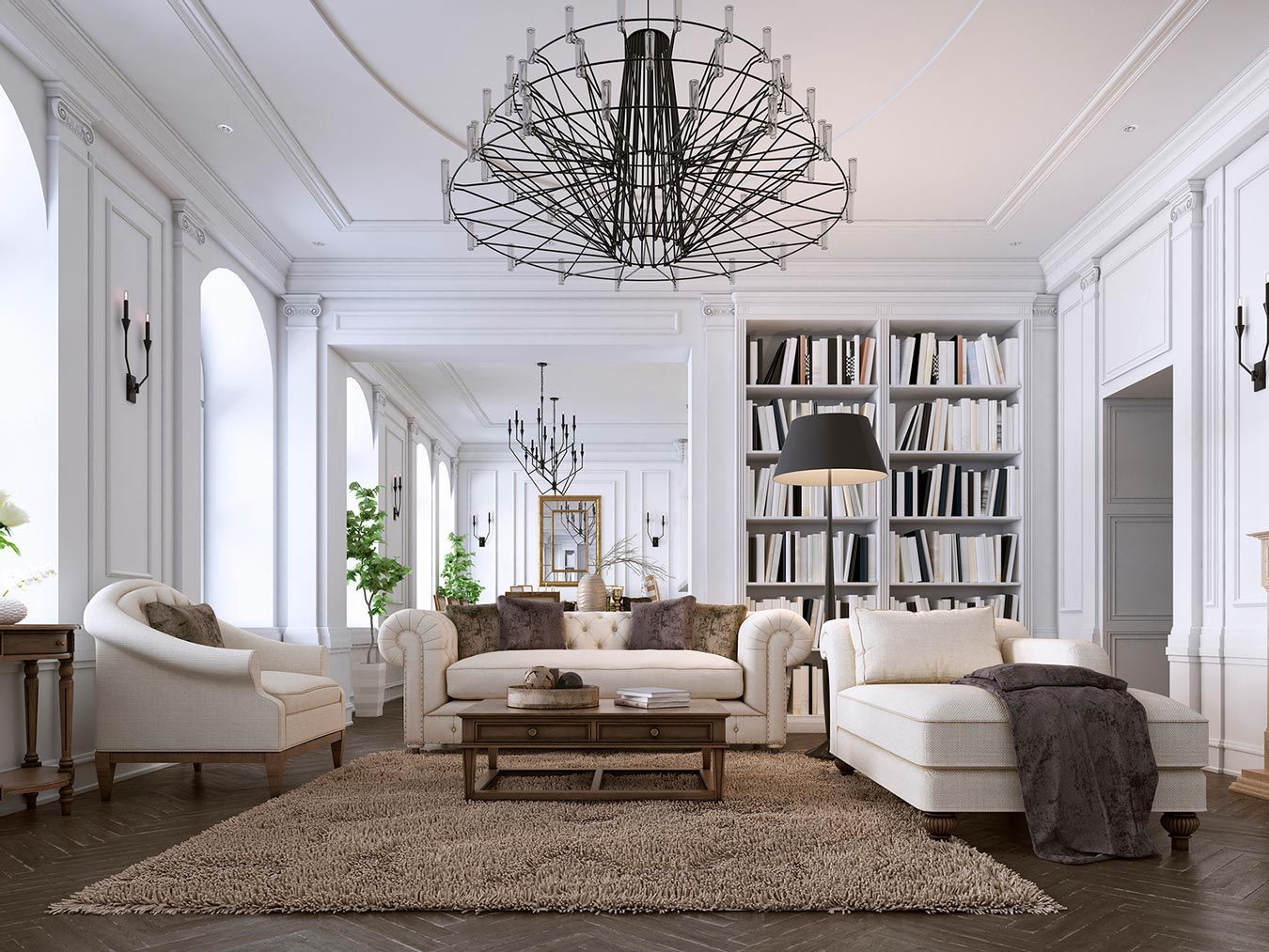 A living room filled with furniture and a chandelier.