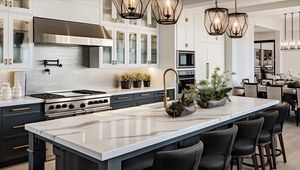 There is a large island in the middle of the kitchen.