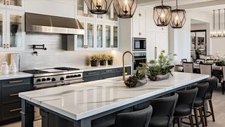 There is a large island in the middle of the kitchen.