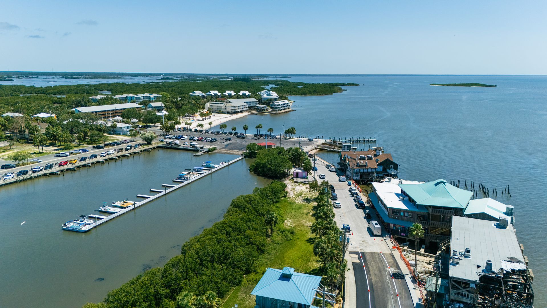 An aerial view of a city next to a body of water.