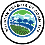 The logo for the williston chamber of commerce is a circle with a farm in the middle.