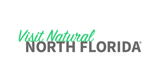 A logo for visit natural north florida on a white background.