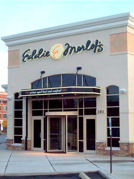The front of eddie merlot 's restaurant is shown