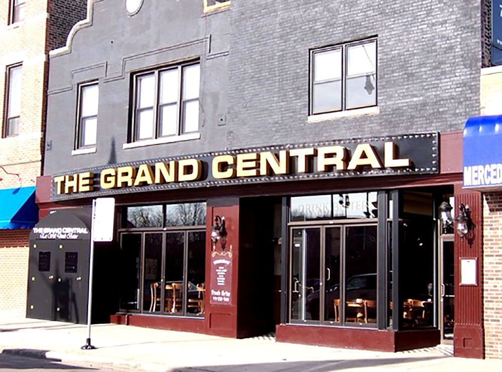 A building with a sign that says the grand central