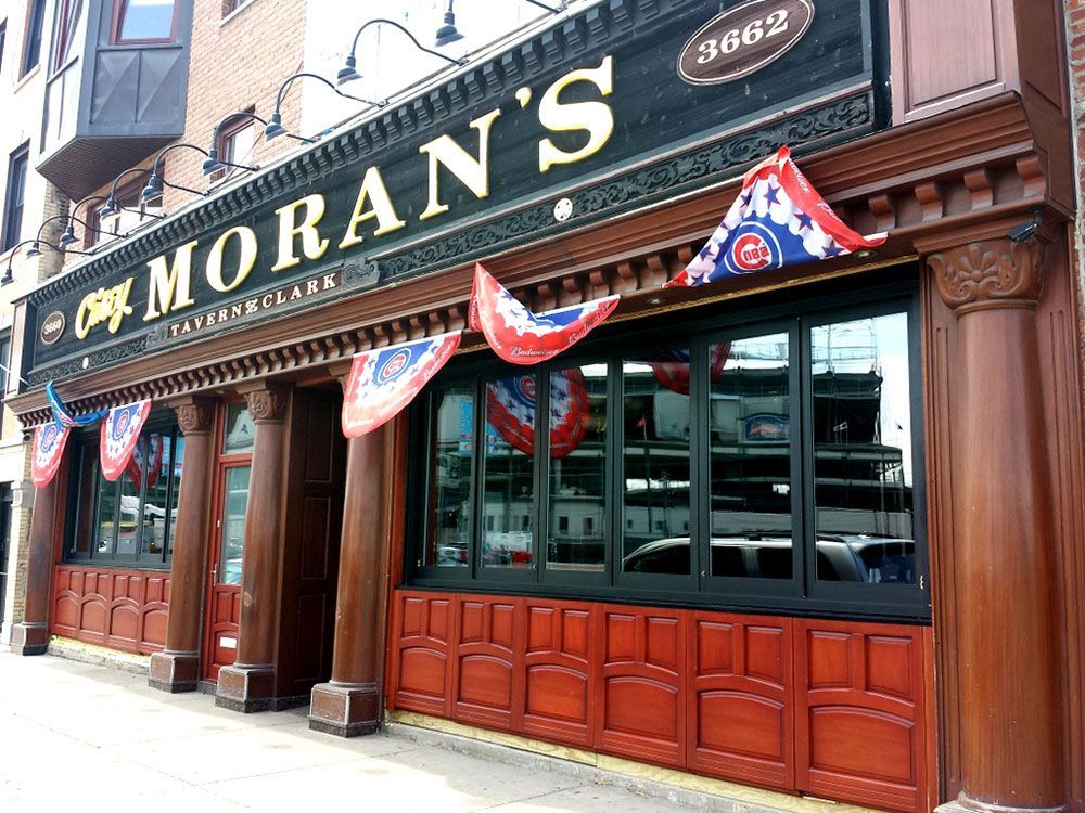A building with a sign that says moran 's on it