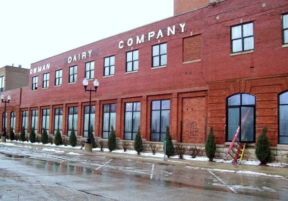 A brick building with the word dairy company on it