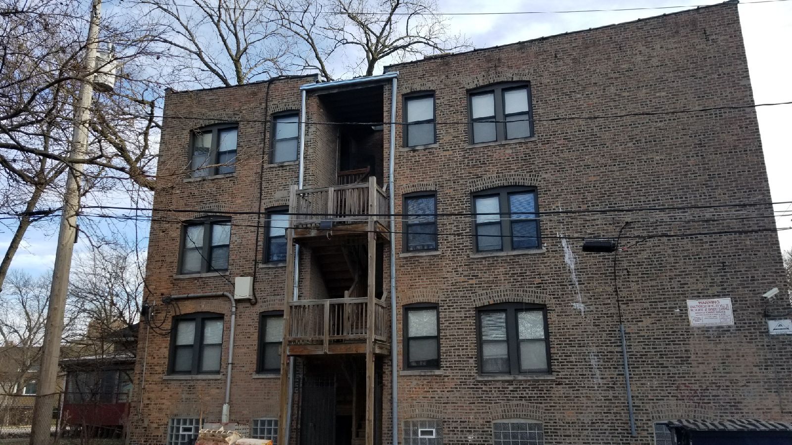 A large brick building with a lot of windows