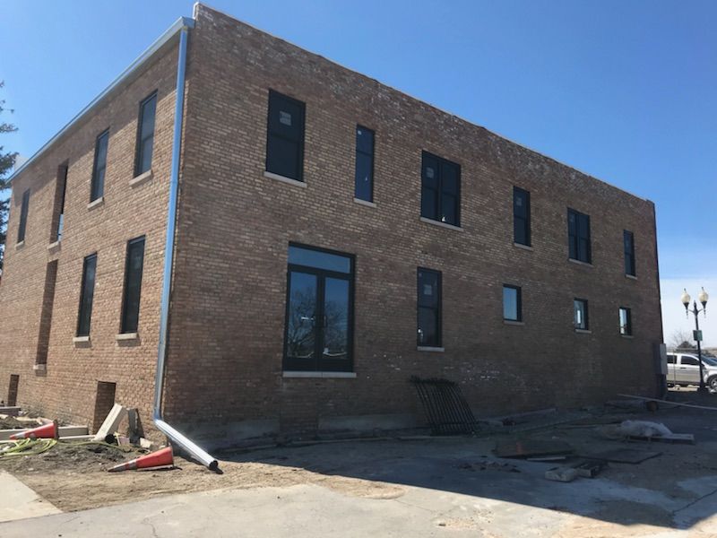 A large brick building with a lot of windows