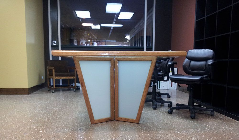 A room with a table and chairs in it