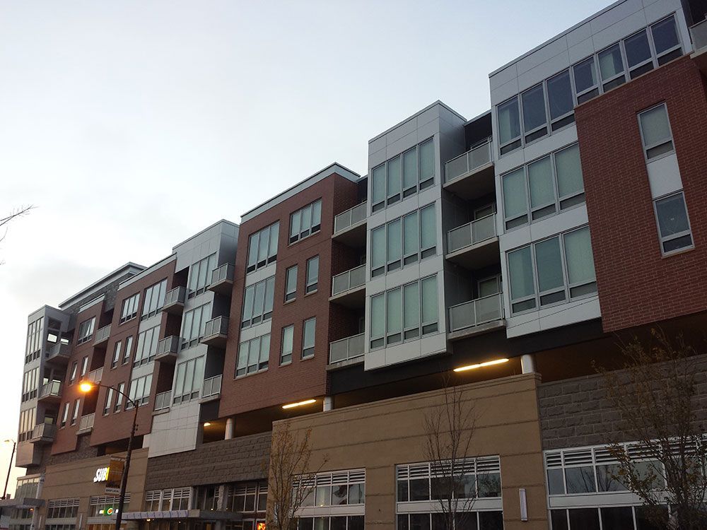 A large building with a lot of windows and balconies