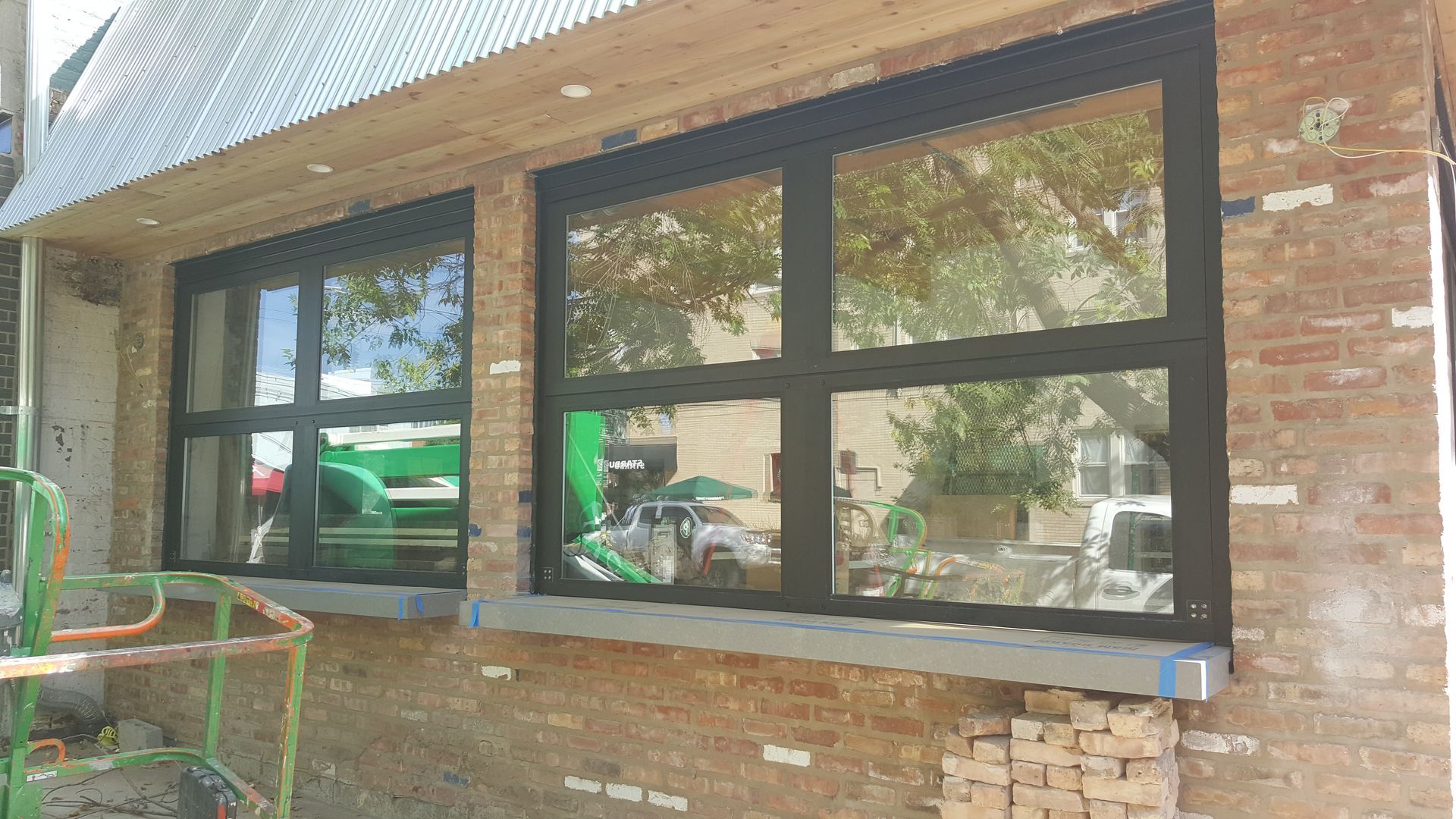 A brick building with a lot of windows on it.