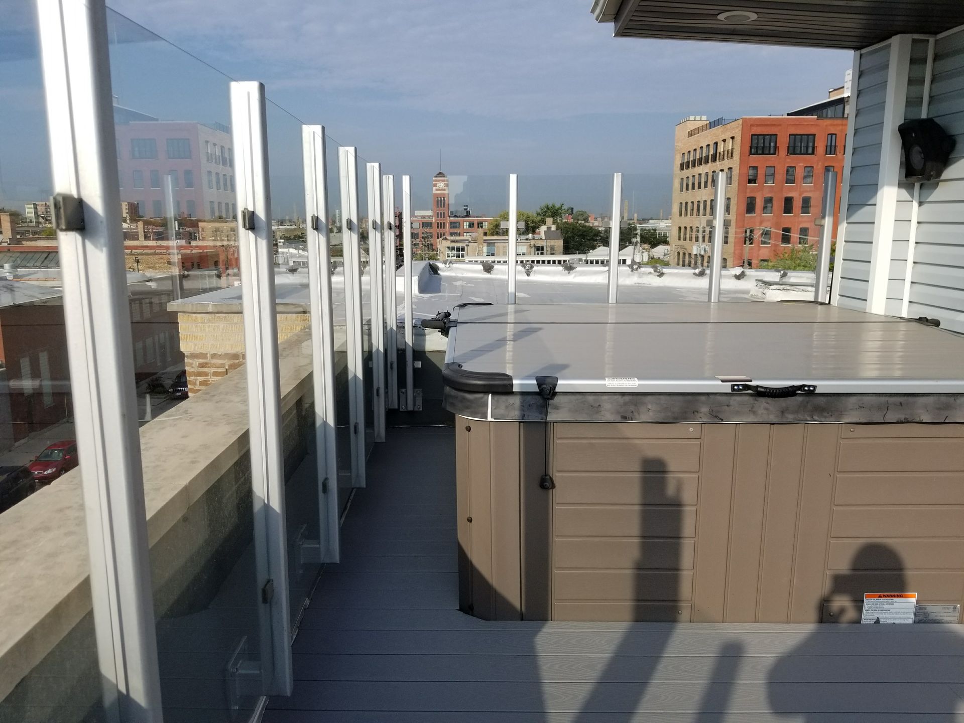 A hot tub on the roof of a building