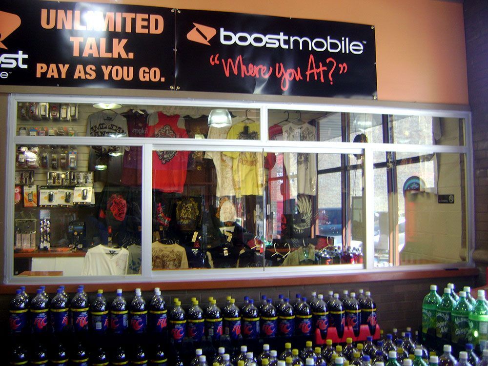 A store with a sign that says unlimited talk pay as you go