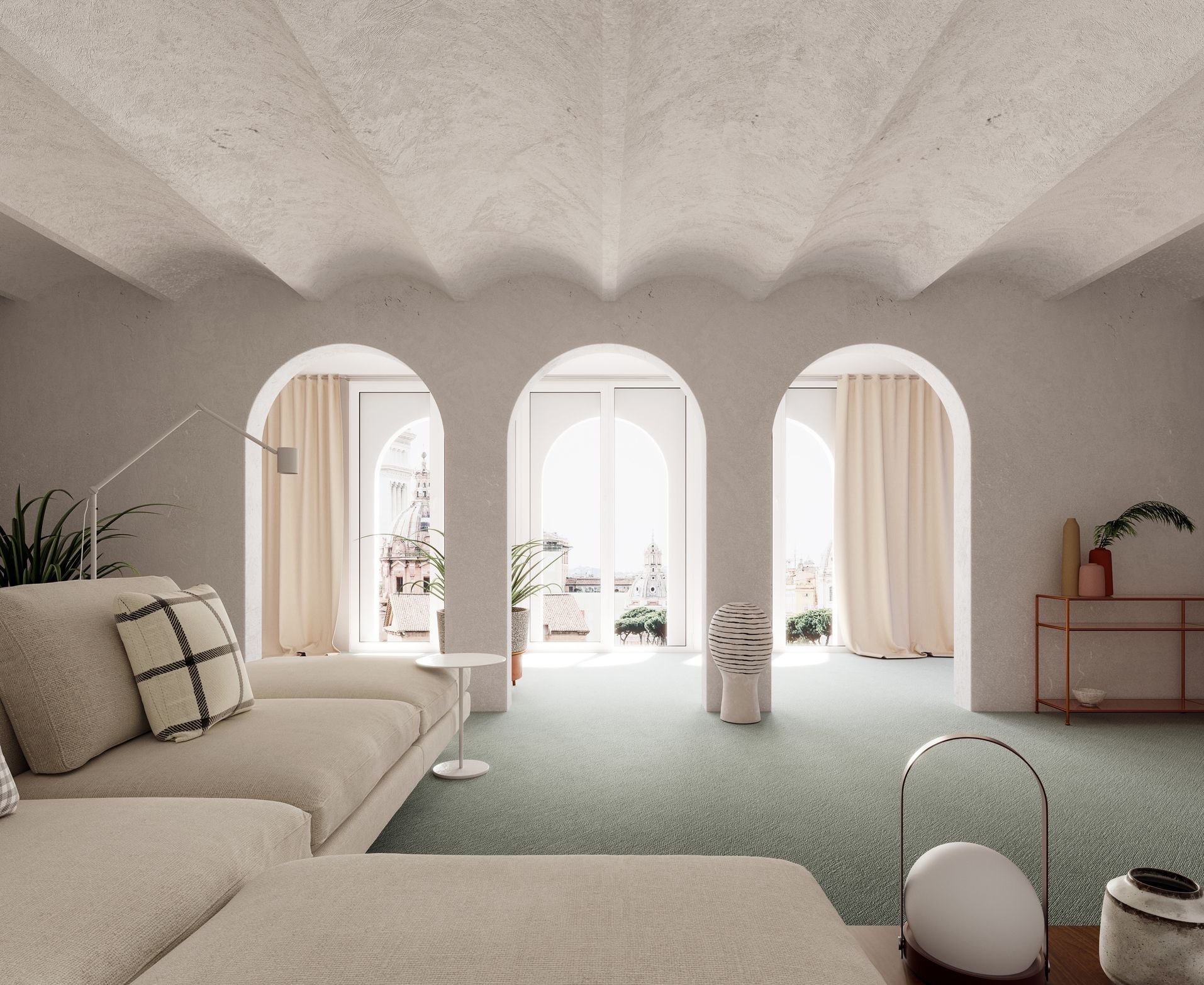 A bright, airy living room with arched doorways, a light green rug, and a cozy cream-colored sectional sofa.