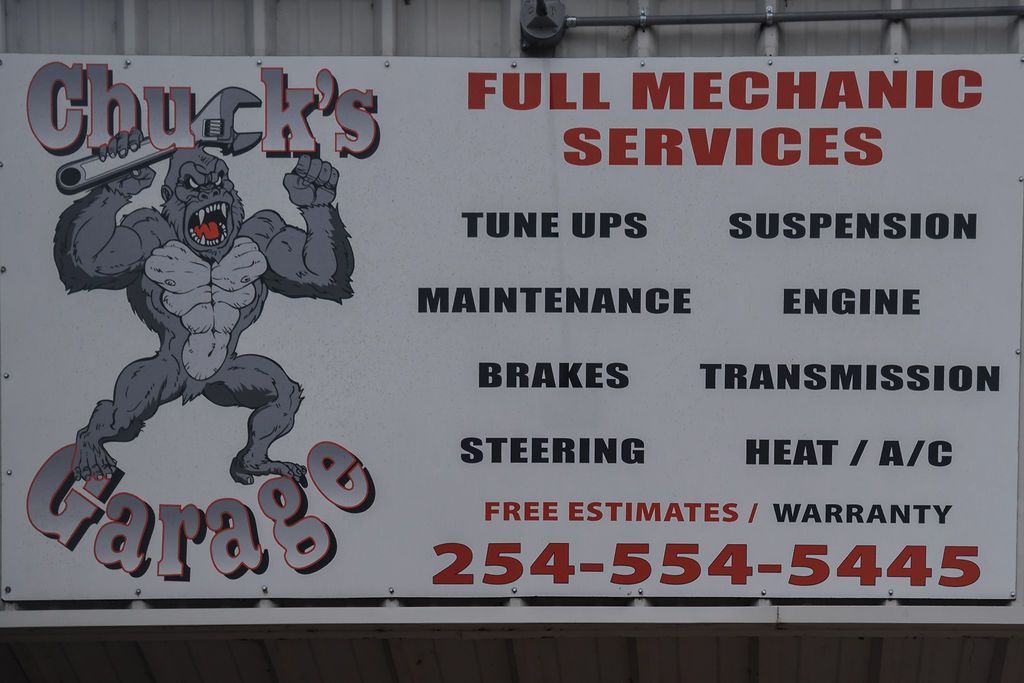 A sign for chuck 's garage full mechanic services | Chuck's Garage
