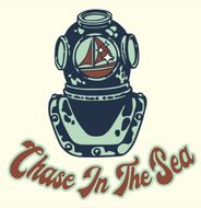 A diving helmet with a sailboat on it and the words chase in the sea