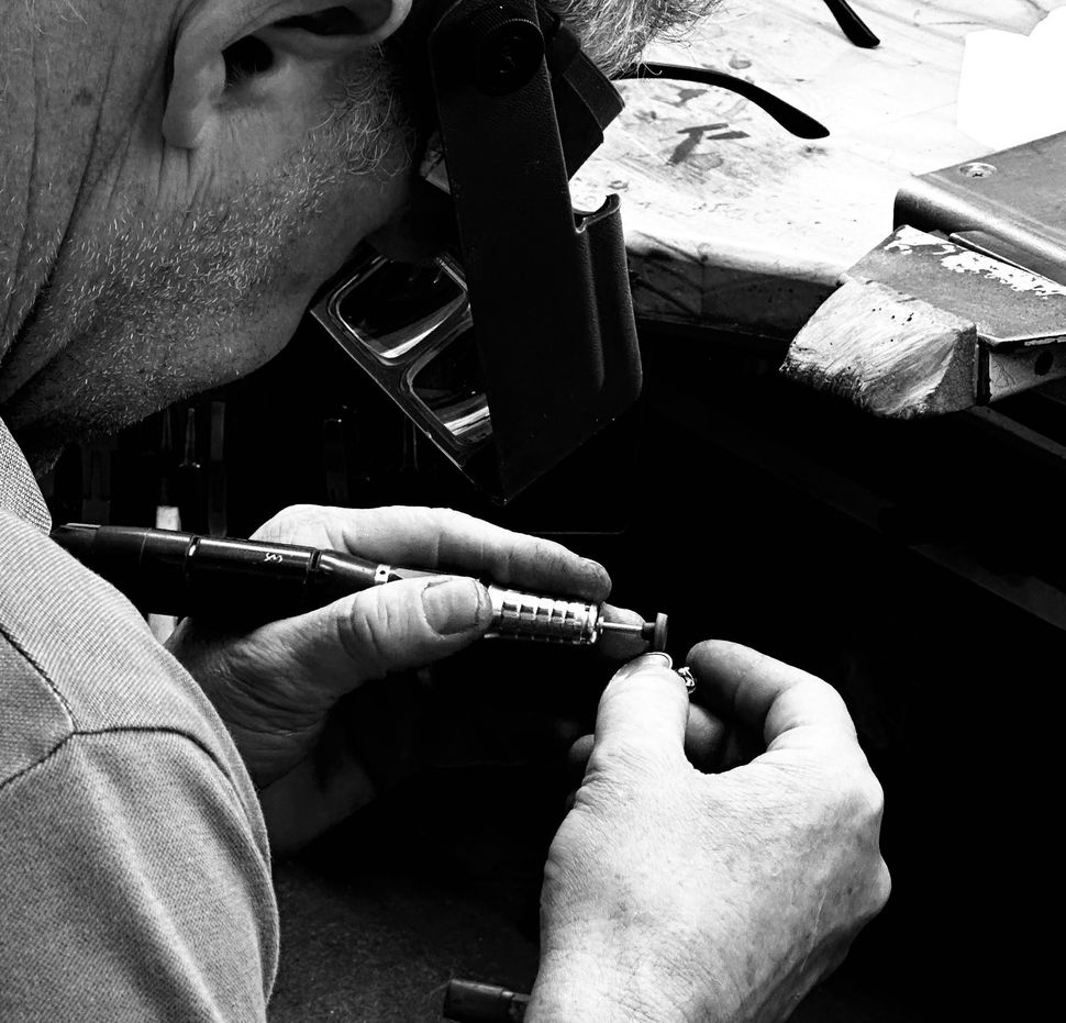 Jeweller inspecting a diamond