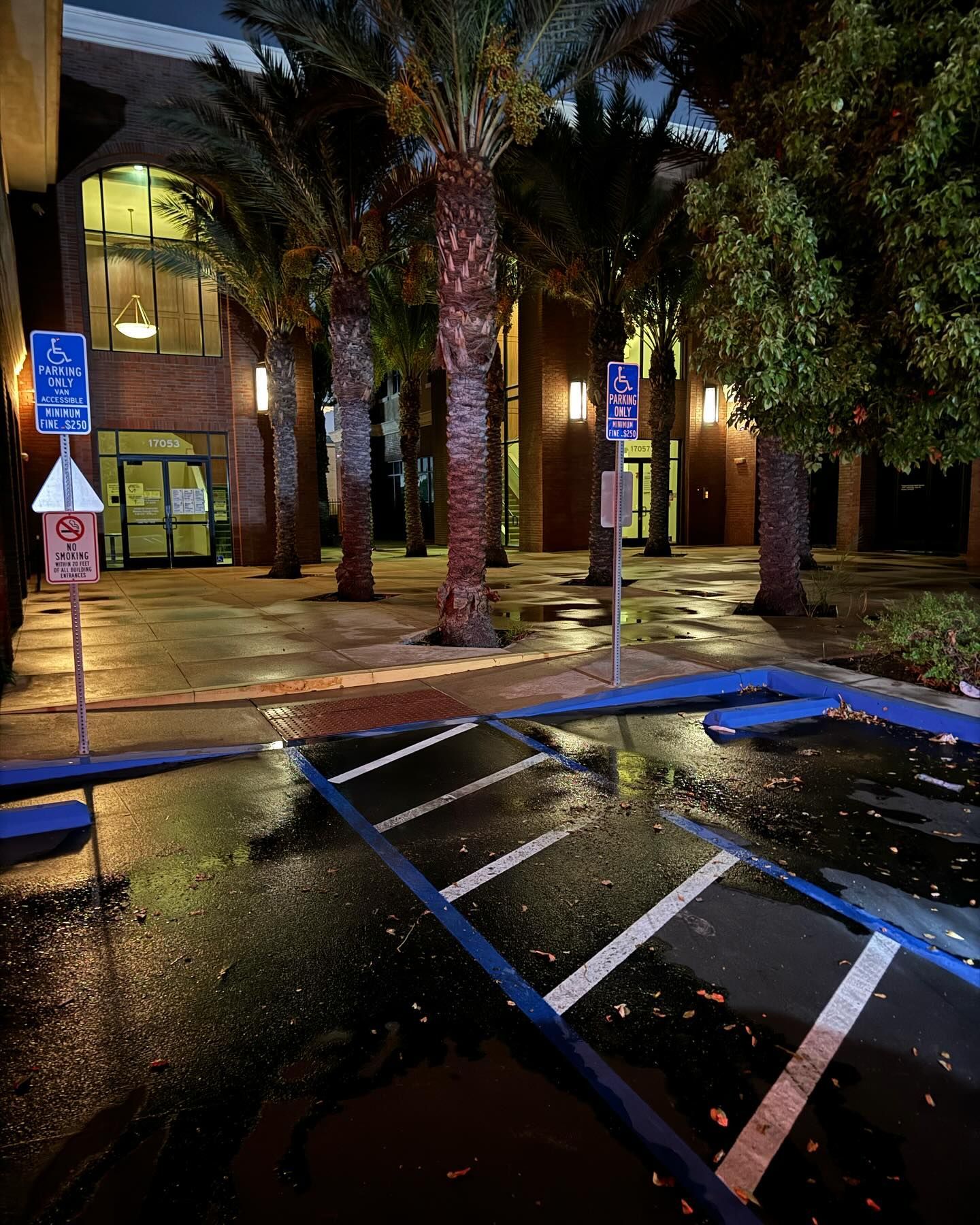 A handicapped parking spot in front of a building