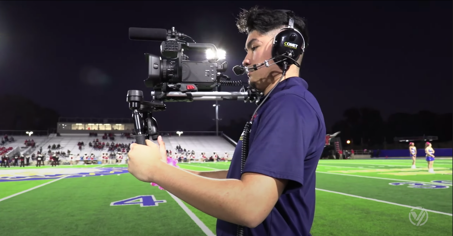 student operating camera during game