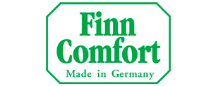 Logo per calzature Finn Comfort, testo e bordo verdi su sfondo bianco; prodotto in Germania.