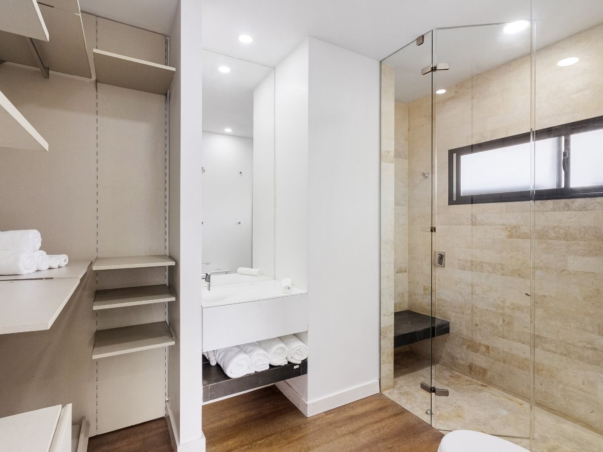 Electrician Inspecting Existing Bathroom Heat Lamp Installation Sunshine Coast