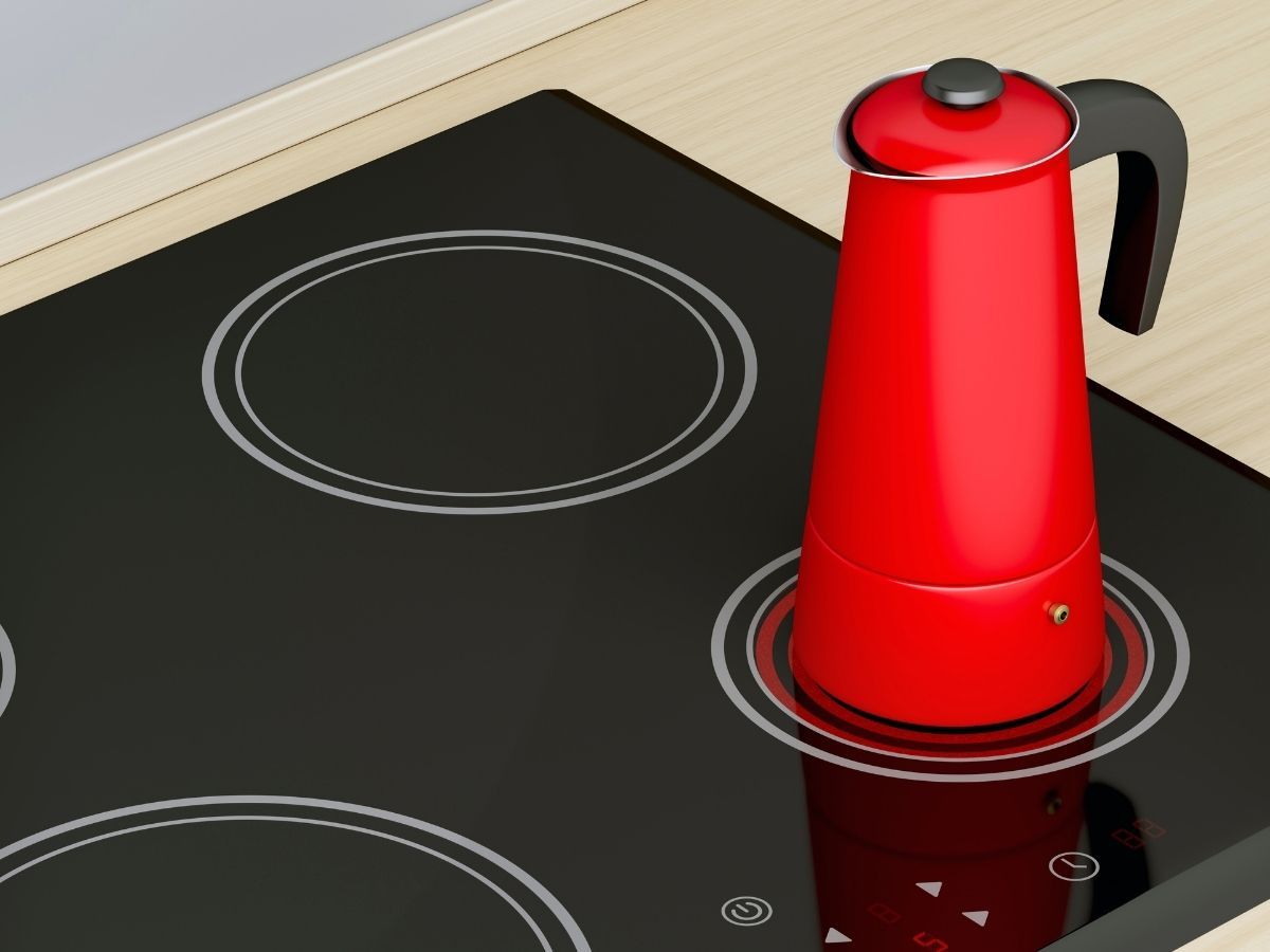 Electrician Fitting Ceramic Cooktop Flush Into Modern Kitchen Surface Sunshine Coast