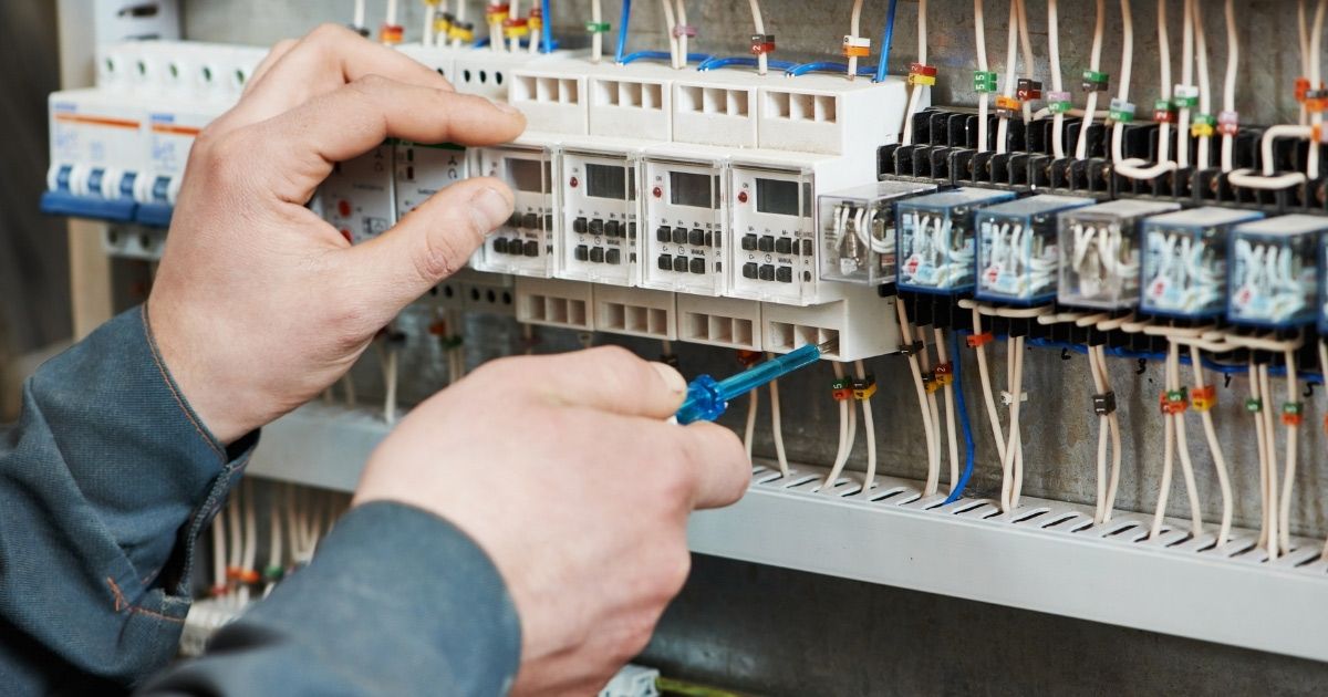 Electrician Team Installing New Commercial Lighting For Local Business Sunshine Coast