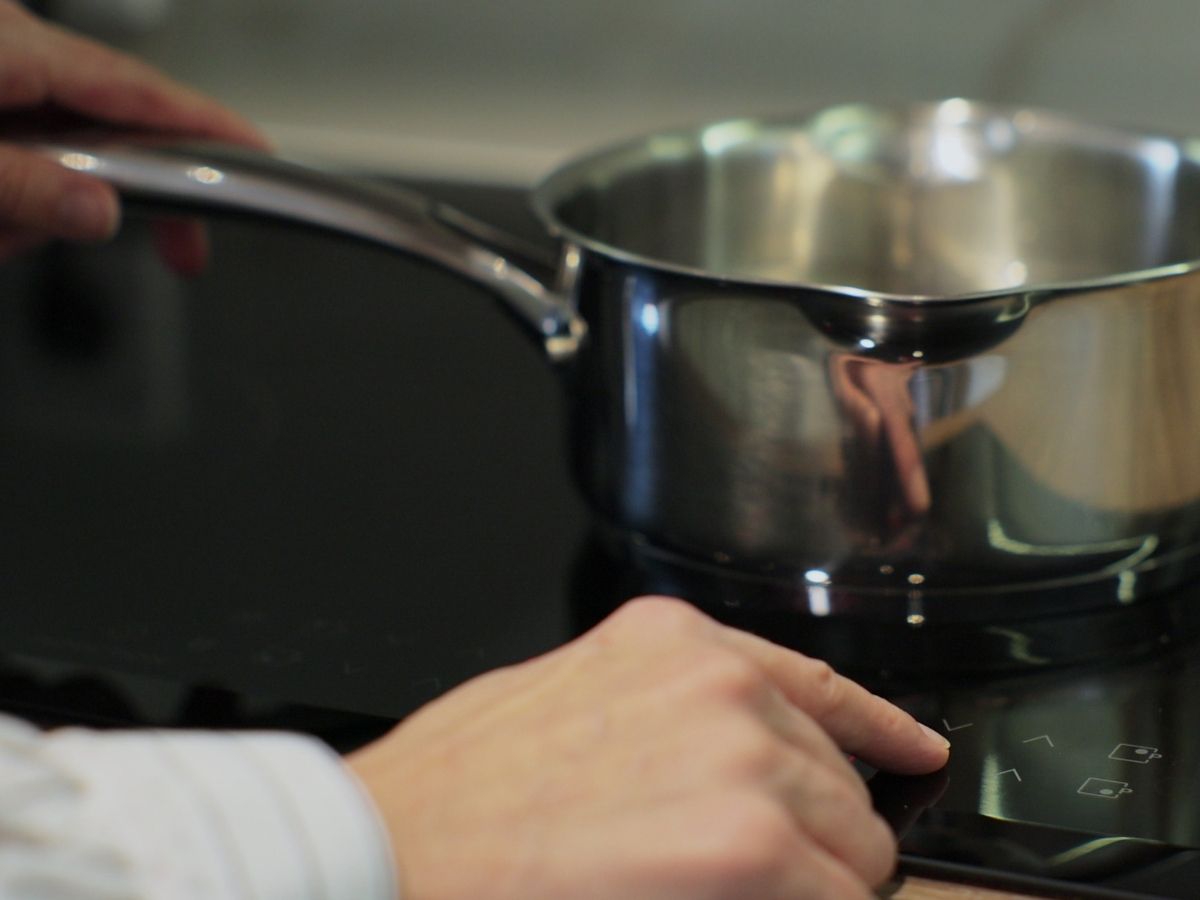 Electrician Fixing Cooktop Power Supply For Safe Operation Sunshine Coast