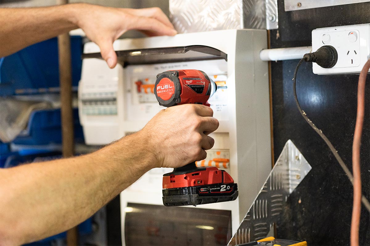 Electrician Sunshine Coast Working On Main Switchboard