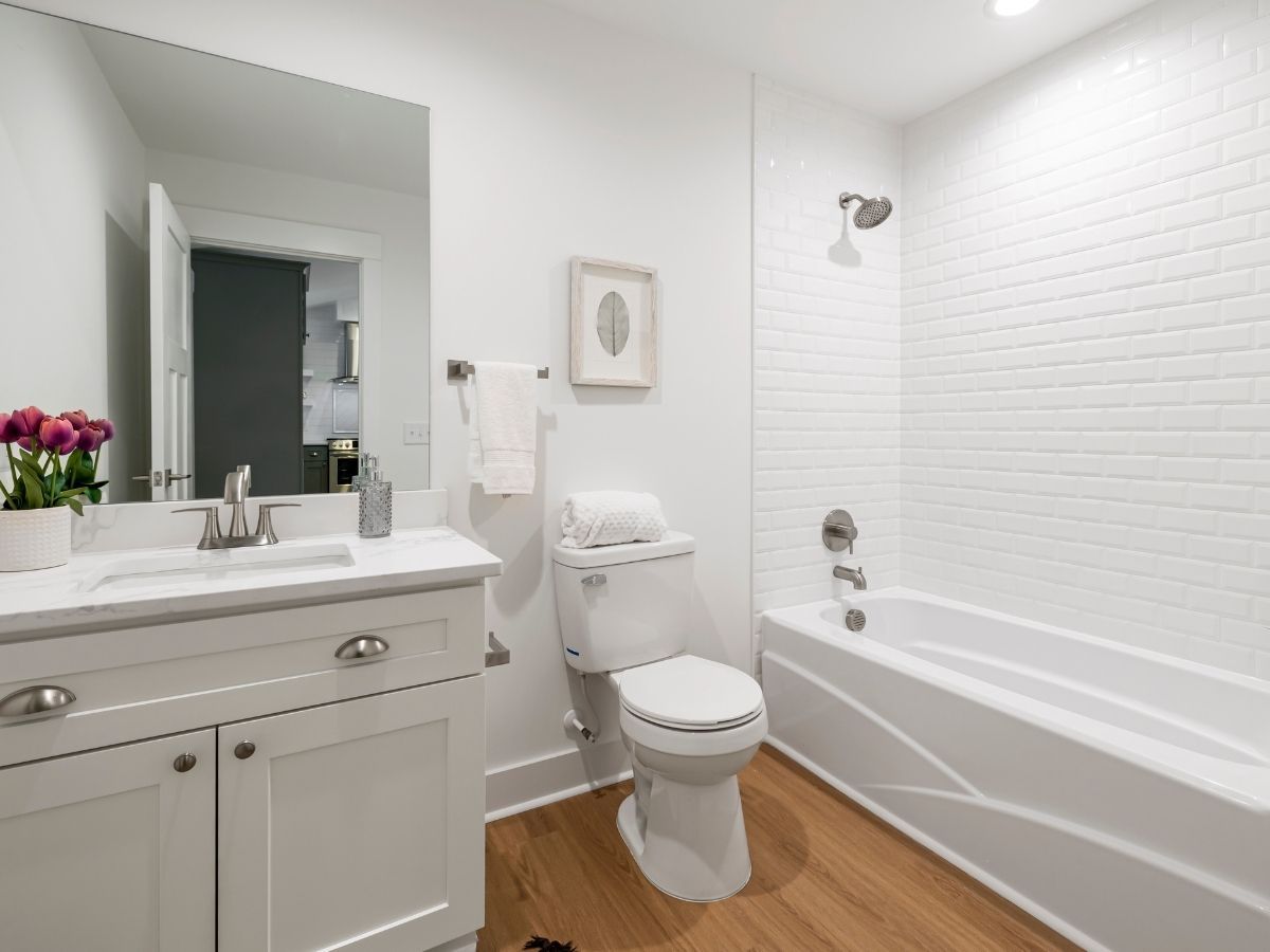 Electrician Repairing Faulty Heat Lamp Wiring For Safe Operation Sunshine Coast