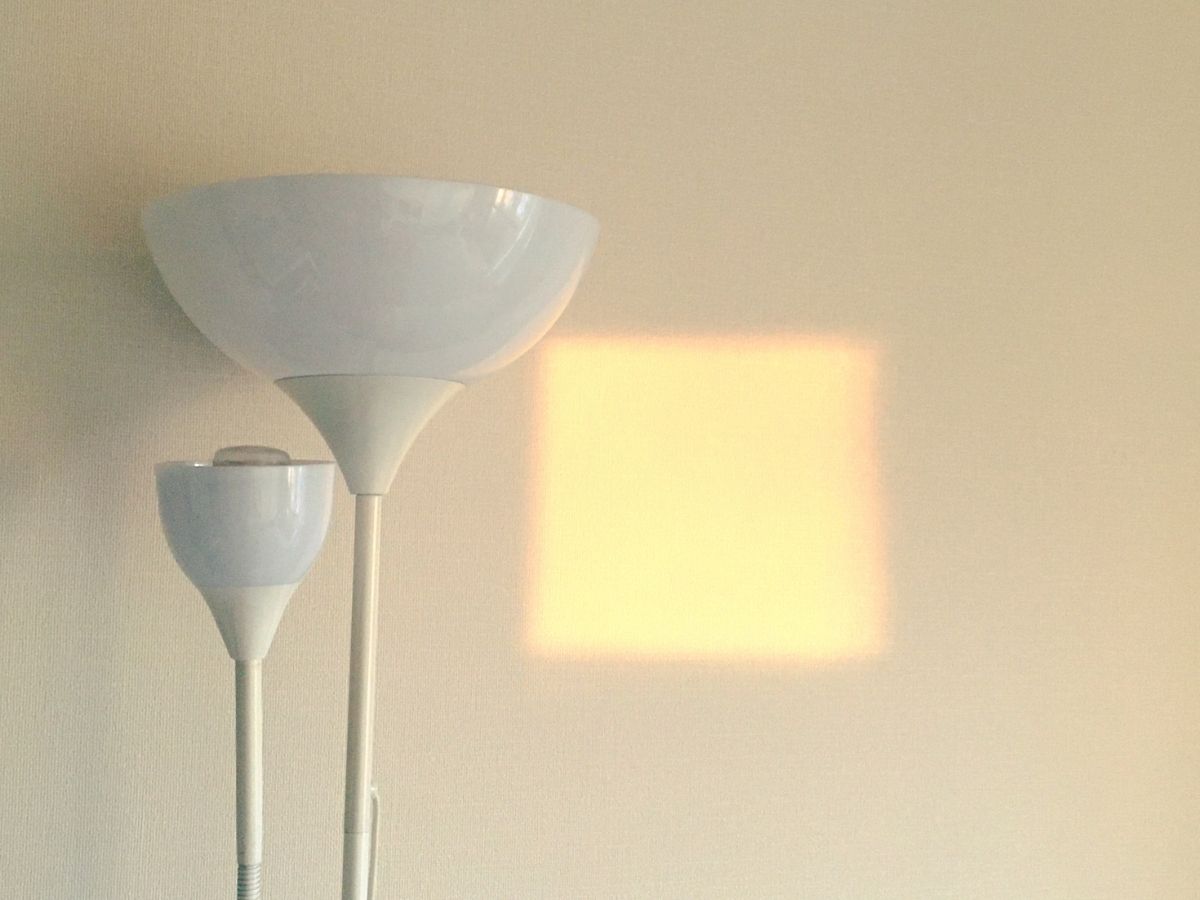 Electrician Replacing Blown Heat Lamp Globe For Local Homeowner Sunshine Coast