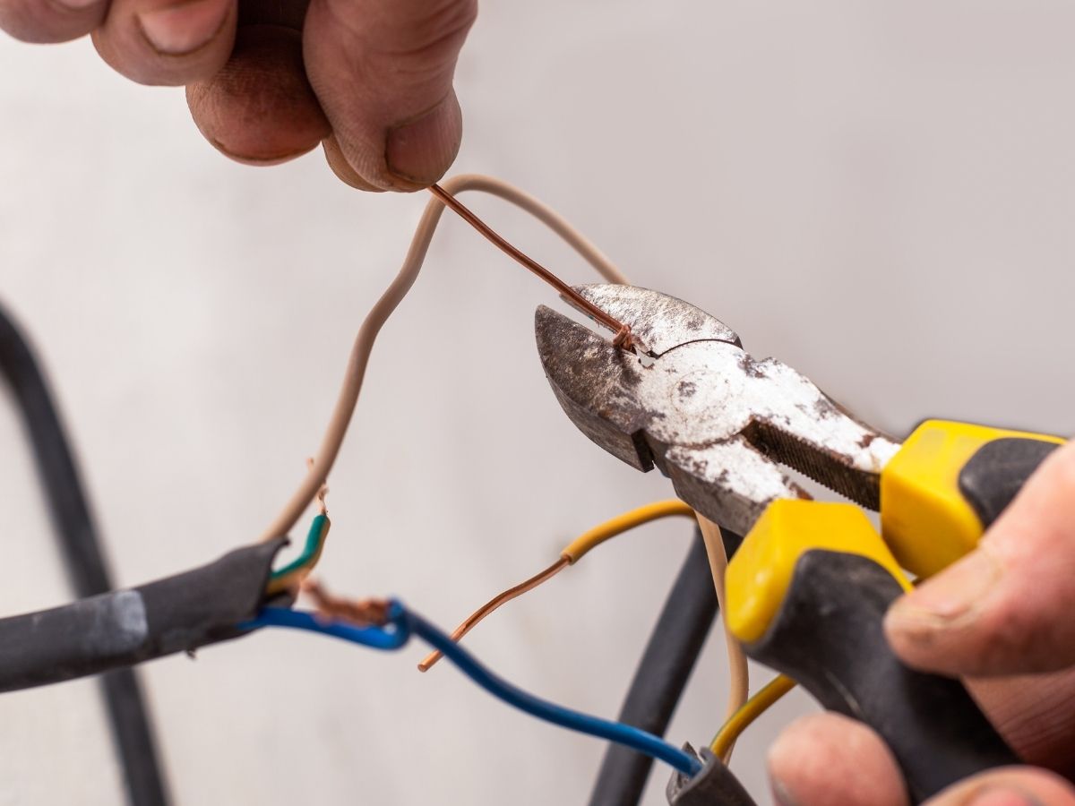 Qualified Electrician Installing Premium Induction Cooktop Sunshine Coast