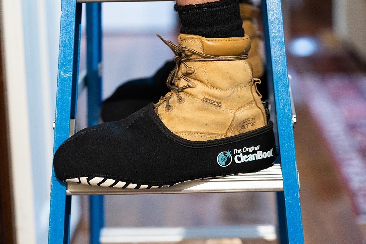 Sunshine Coast Electrician Wearing Clean Boot Covers