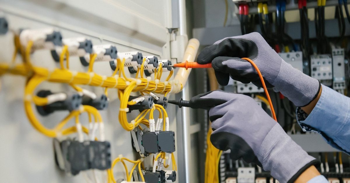 Electrician Completing Detailed Switchboard Test For Safety Compliance Sunshine Coast