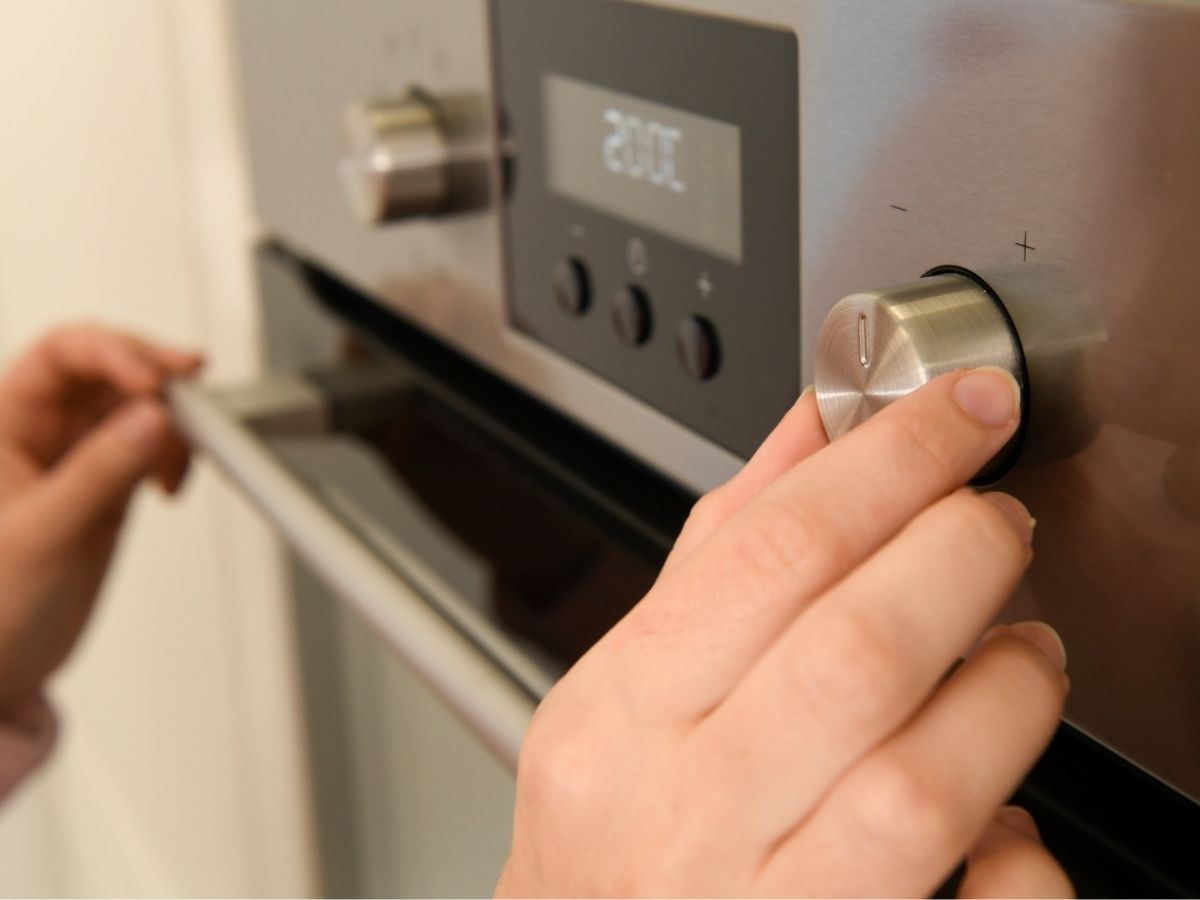 Electrician Testing And Commissioning New Oven Installation Sunshine Coast