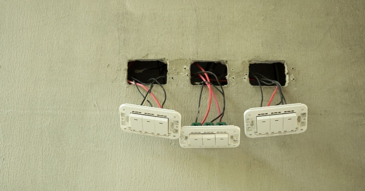 Electrician Reviewing Wiring Condition For Electrical Safety Report Sunshine Coast