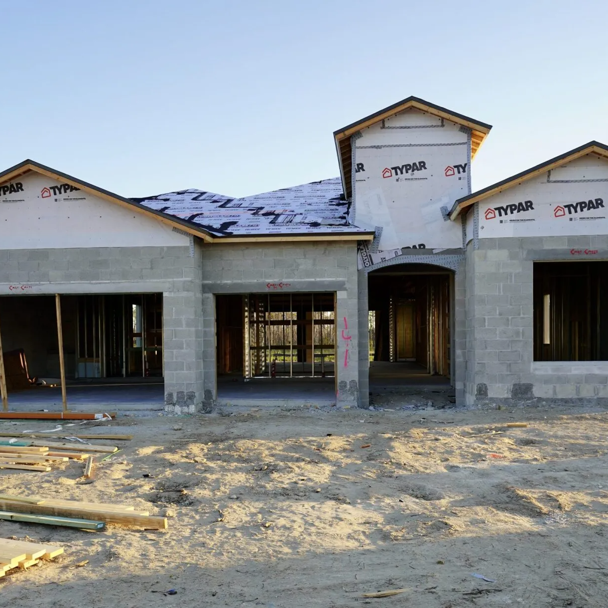 A house under construction with styrofoam on the roof