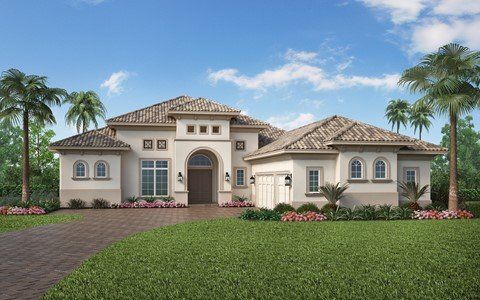 A large white house with a tiled roof and palm trees in front of it.