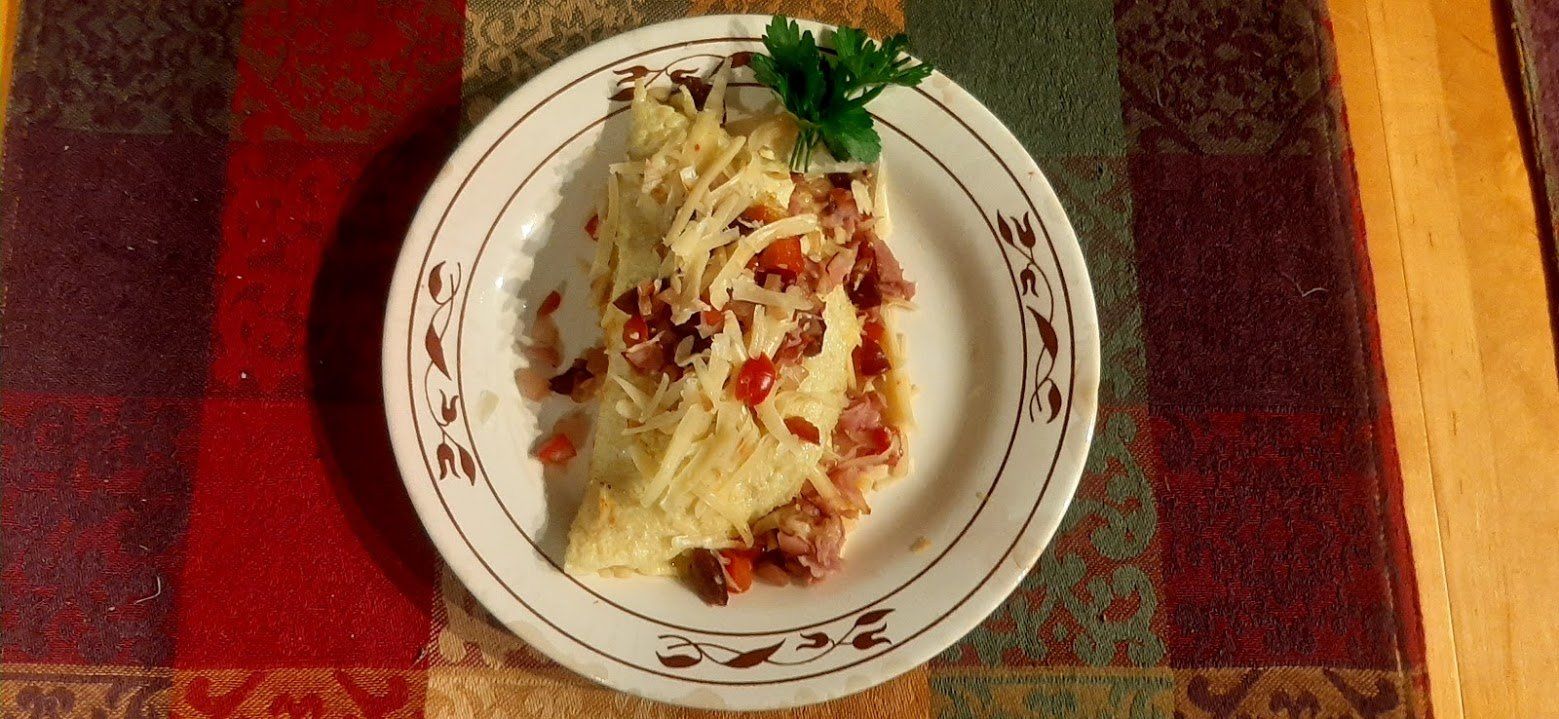 A white plate with a piece of food on it