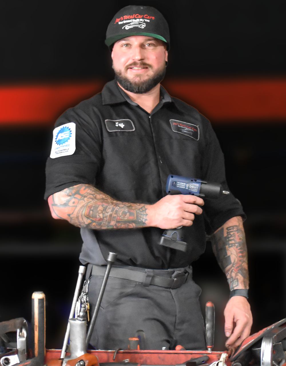 jay working on white suv | Jay's Total Car Care