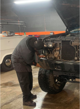 mechanic workingon truck | Jay's Total Car Care