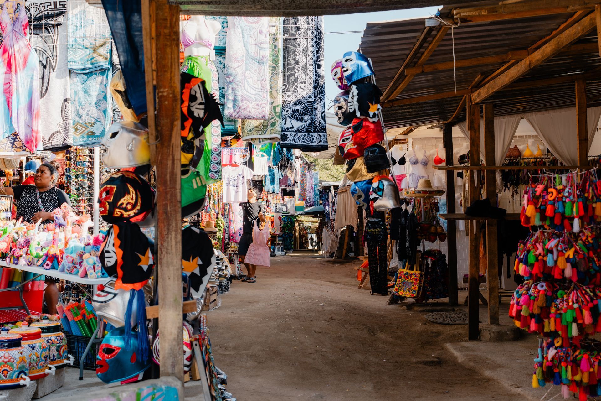 A market filled with lots of toys and clothes.