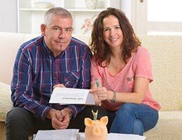 Couple Signing Life Insurance Contract — Insurance in Port Orange, FL